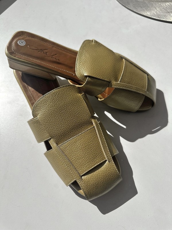 Straps and buckles shape uppers for summer sandals