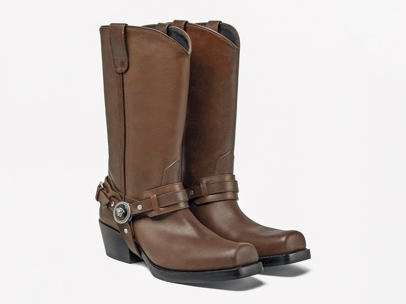 Cowboy boots with tall shafts and pointed toes