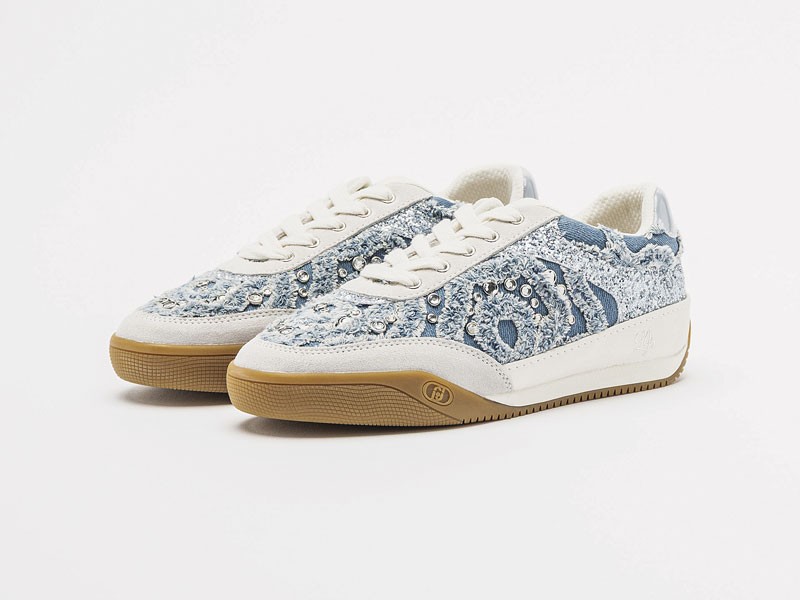 Fashion sneakers combine cutouts, laces and wavy soles