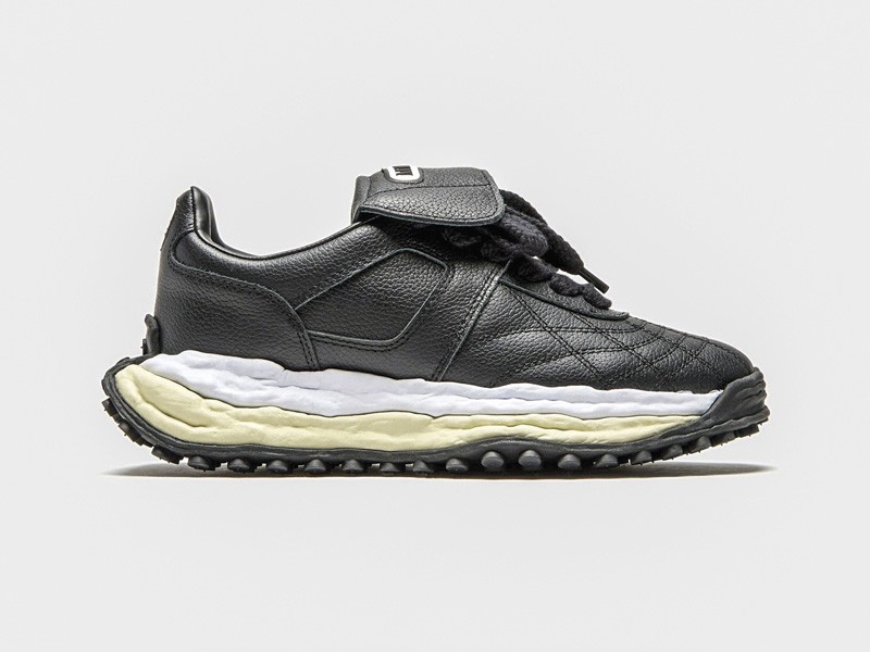 Retro futsal-inspired footwear as urban sneakers