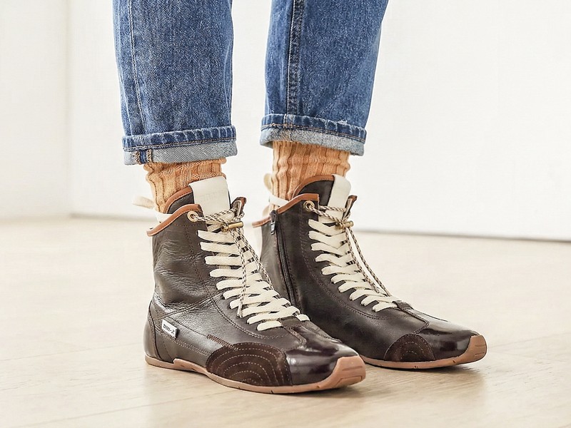Urban boxing boots with tall shafts and statement lacing