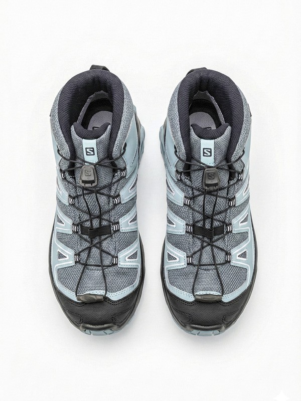 Kids outdoor footwear with traction soles and protective reinforcements