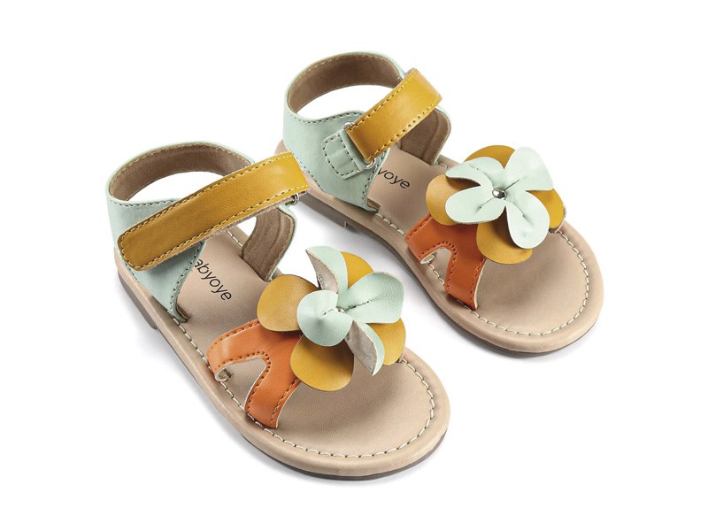 Open children’s shoes: Joyful steps