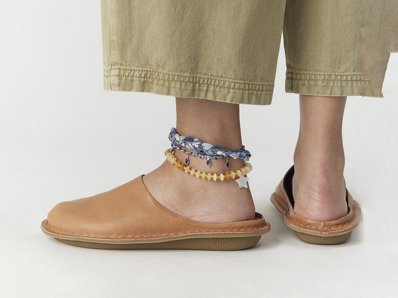 Indoor mules combine closed toes and open heels