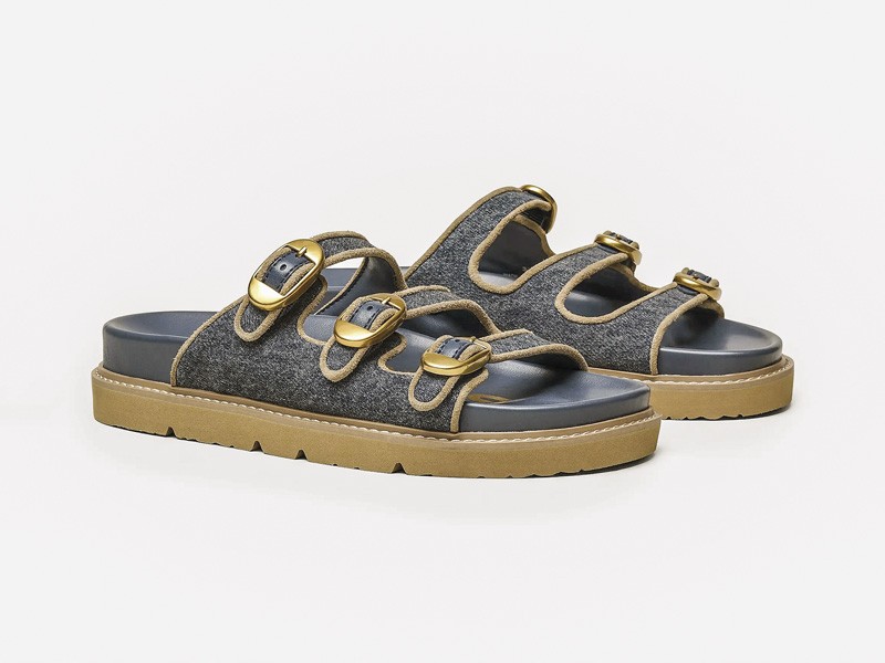 Hardware transforms sandals through buckles, studs and crossings