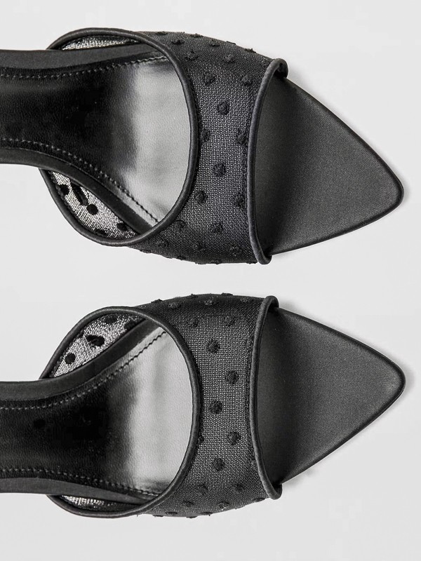 Two-tone contrasts define polka-dot footwear and bags