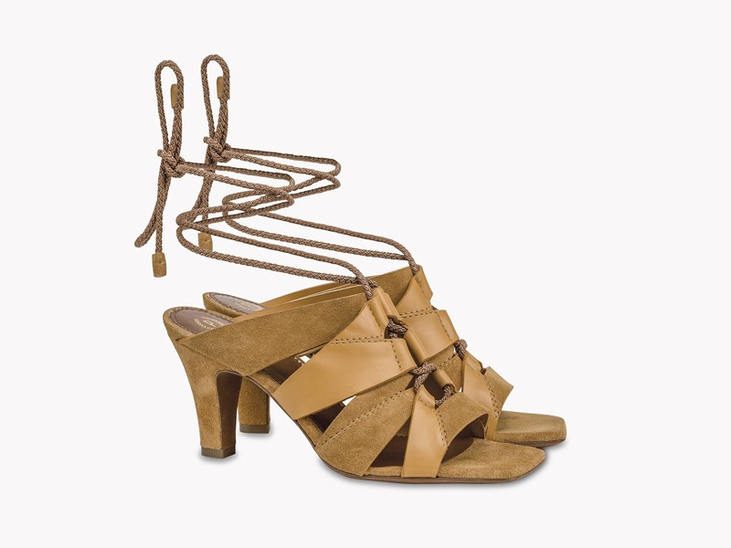 Earth and blue tones differentiate high-heeled sandals