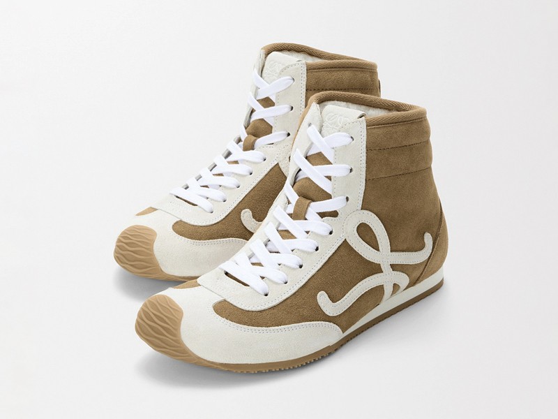 Urban boxing boots with tall shafts and statement lacing