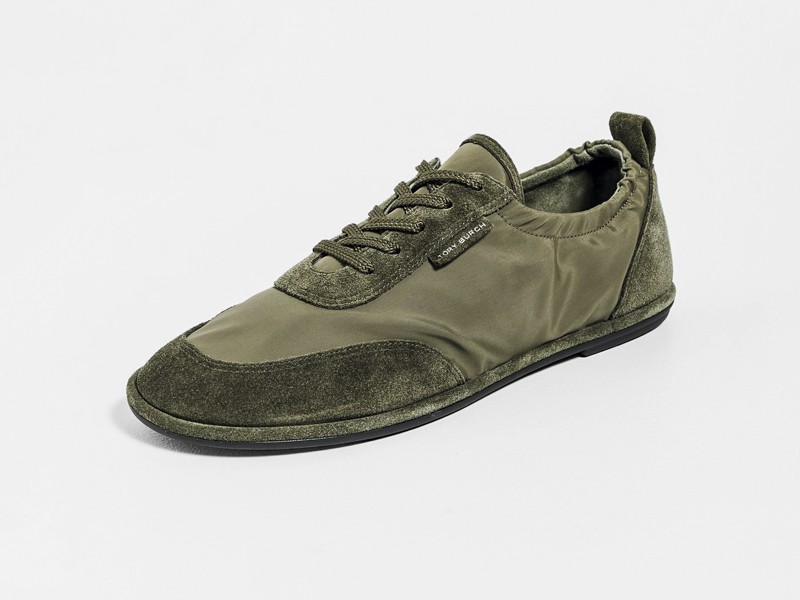 Olive-toned urban sneakers with suede cues and gum sole units