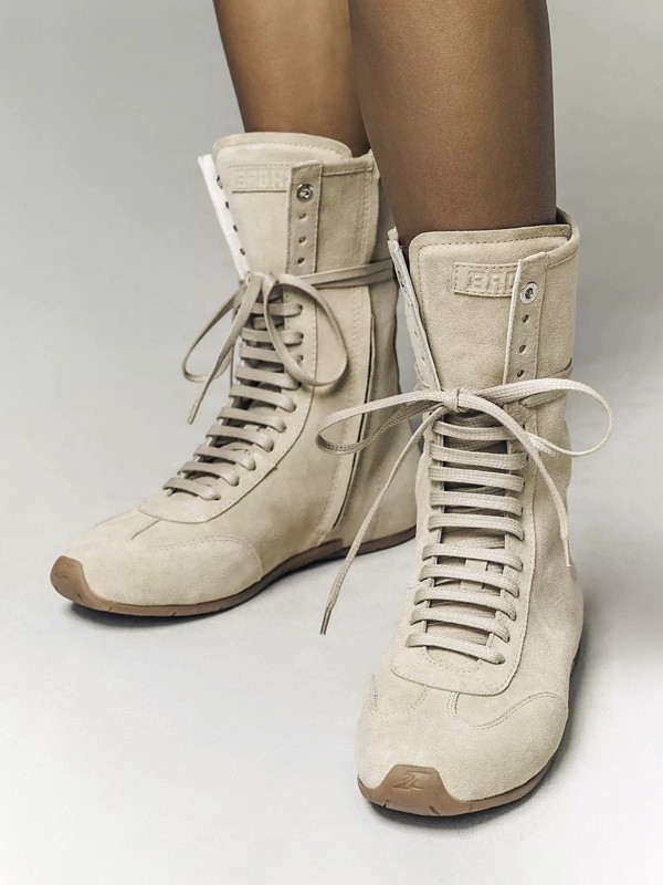 Urban boxing boots with tall shafts and statement lacing