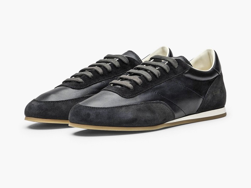 Olive-toned urban sneakers with suede cues and gum sole units