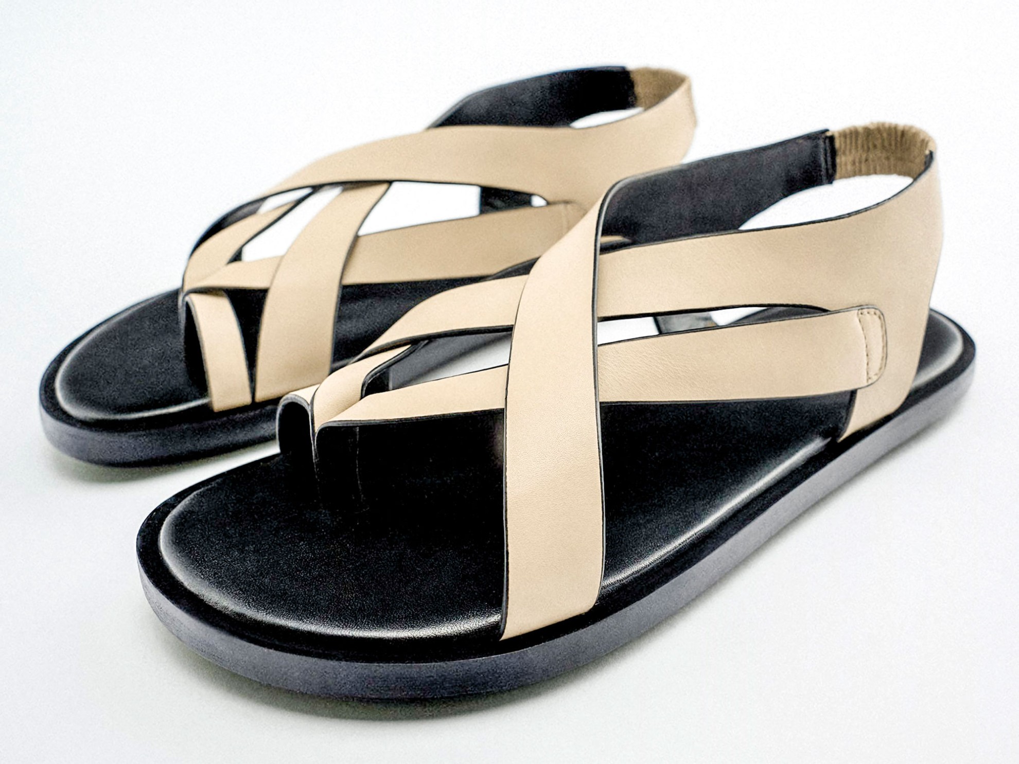 Flat sandals with strips