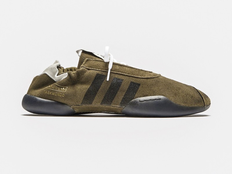 Olive-toned urban sneakers with suede cues and gum sole units