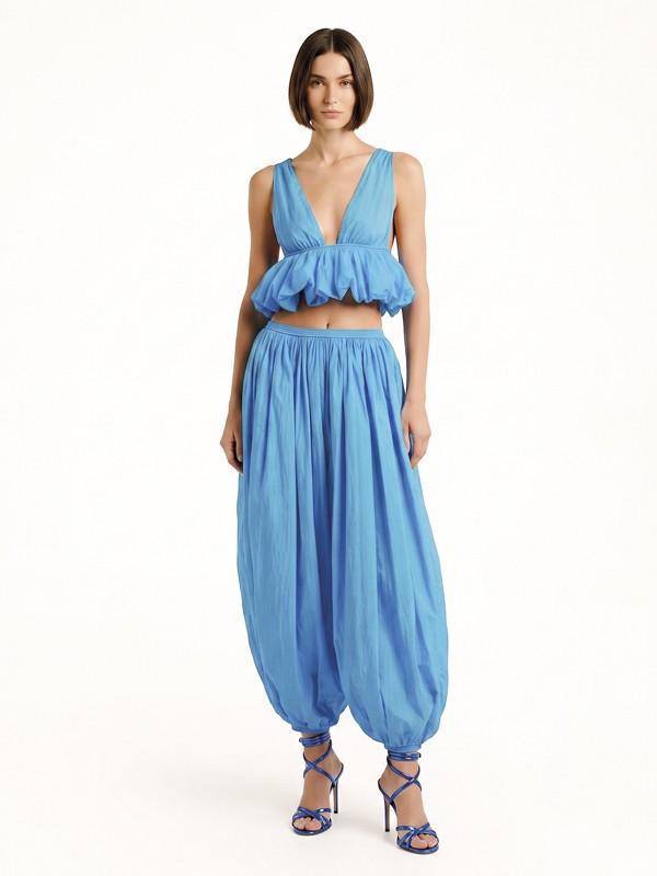 Earth and blue tones differentiate high-heeled sandals