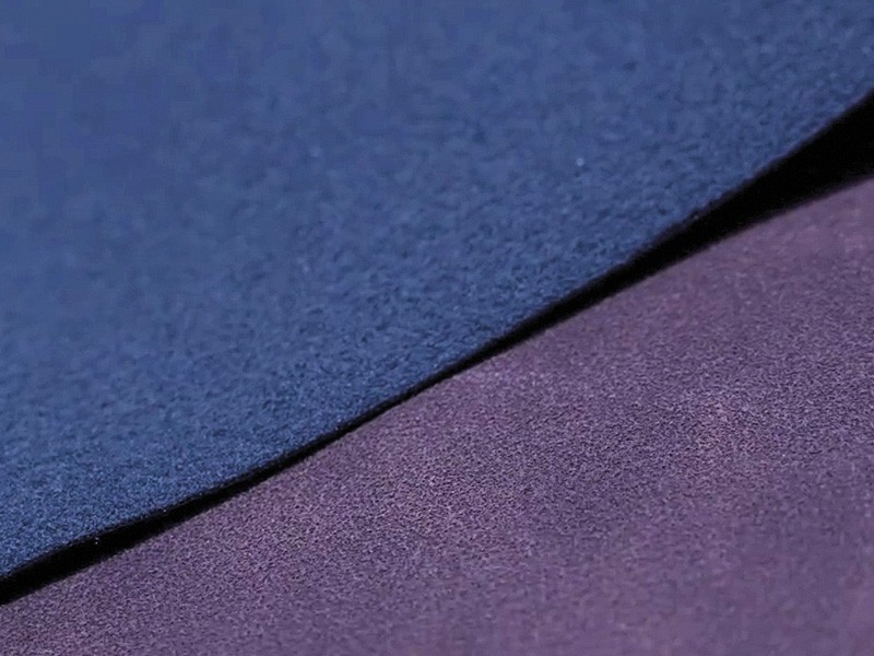 Footwear upper material presented in two colourways, showing surface texture and edge structure. How to Specify Synthetic Materials for Footwear: Flexing, Hydrolysis, Abrasion and Application