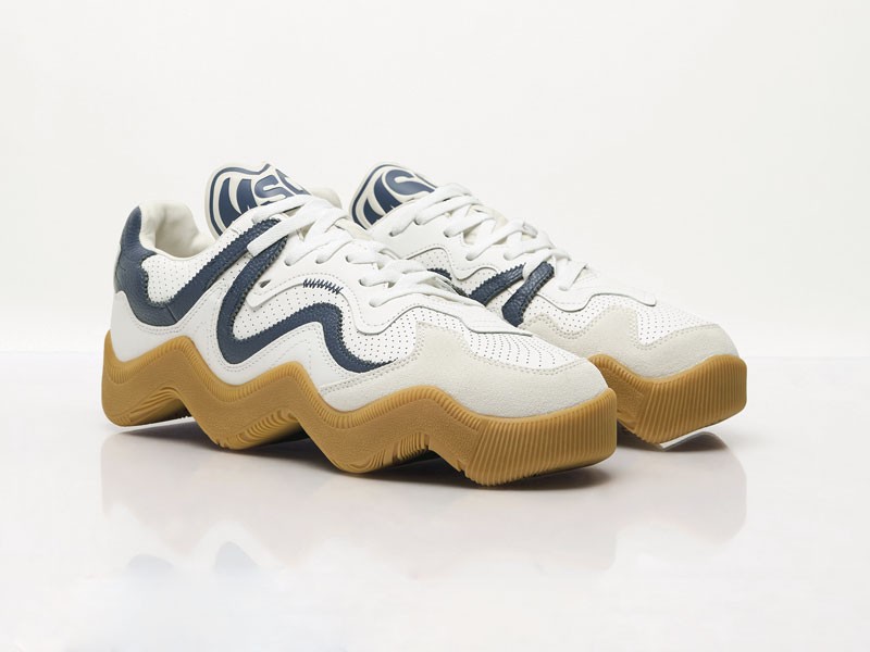 Fashion sneakers combine cutouts, laces and wavy soles
