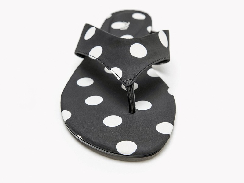 Two-tone contrasts define polka-dot footwear and bags
